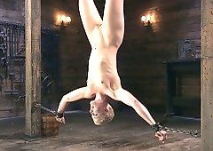 Slave hooked upside down suspended