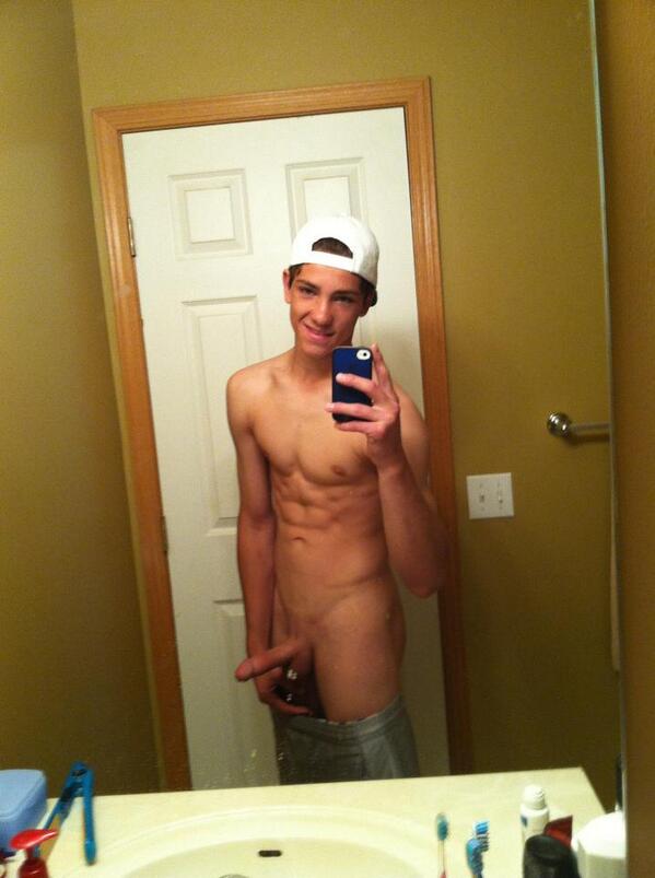 Hot young guy naked in mirror