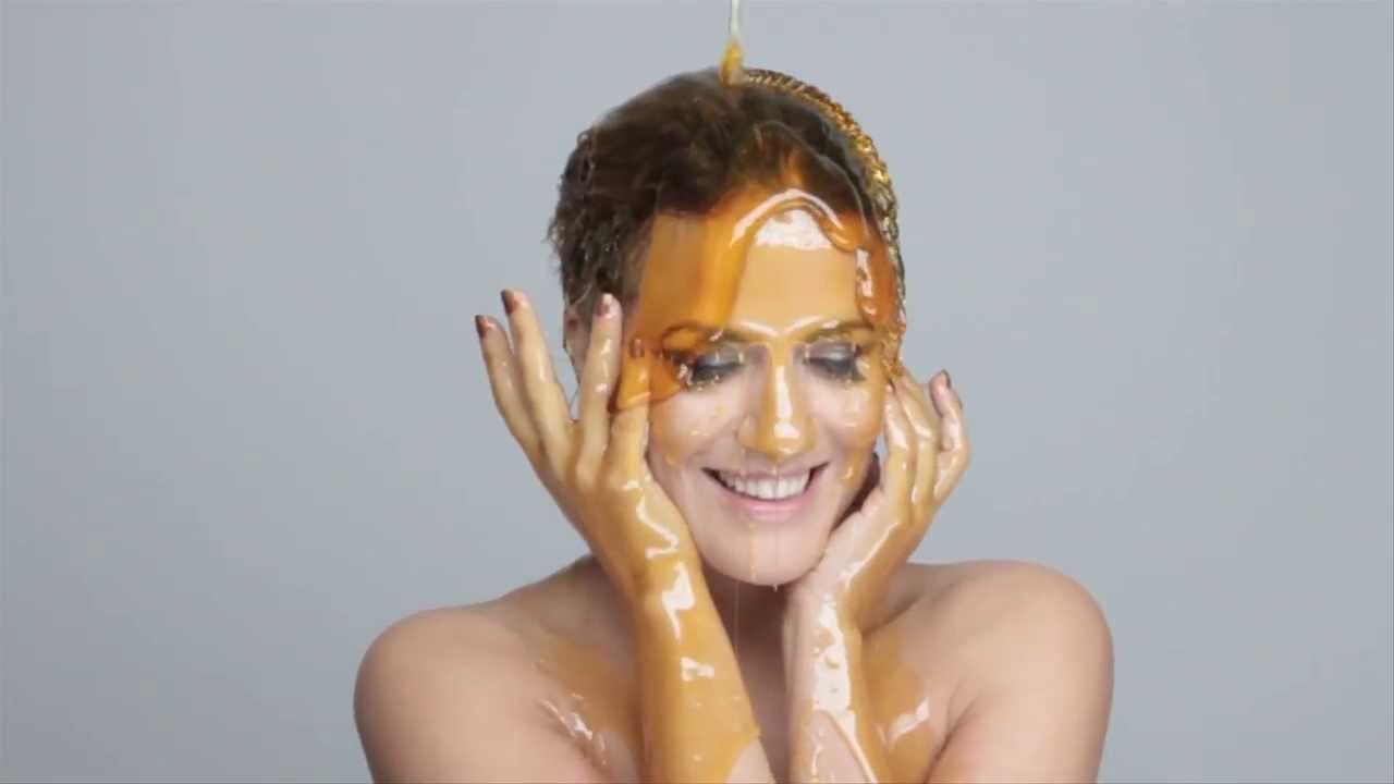 Naked women covered in honey